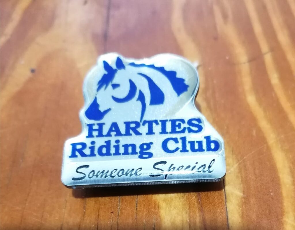 At our Christmas Show 2021 Club Colours were awarded to Harties members for outstanding Equestrian achievement. The proud awardees may now wear the Harties Badge plus official clothing.